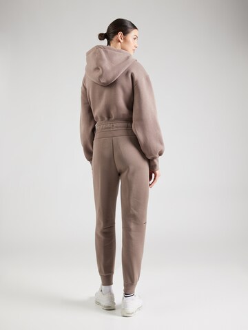 Nike Sportswear Tapered Broek 'TCH FLC' in Bruin
