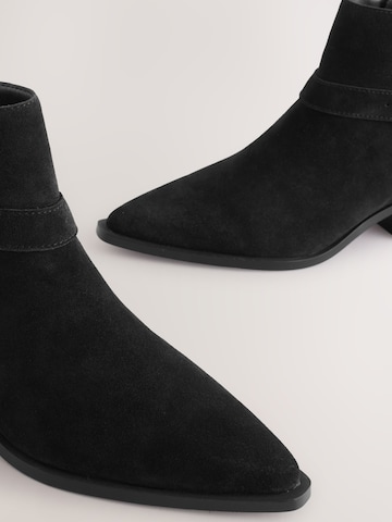 Next - Botim em preto