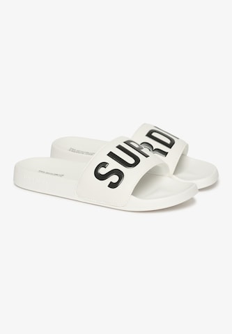 Claquettes / Tongs Superdry en blanc