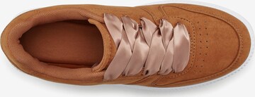 LASCANA Sneakers in Brown