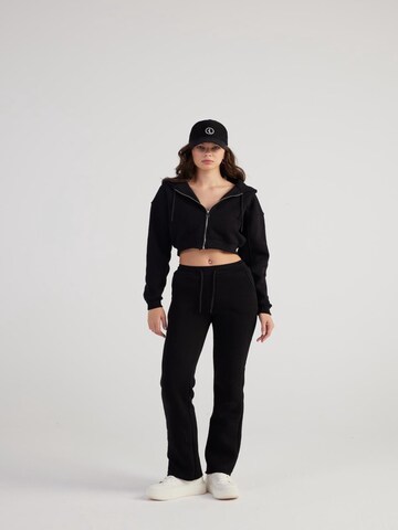 HOLLY LOLLY Regular Trousers in Black