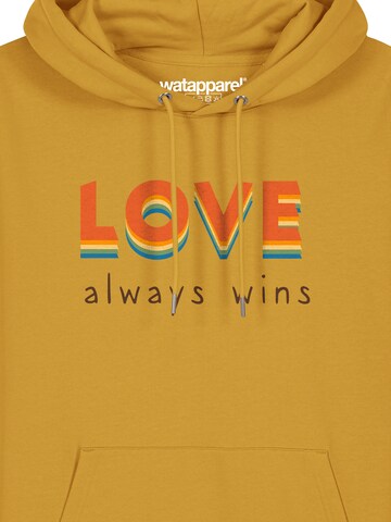 Watapparel Sweatshirt 'Love always wins' in Geel