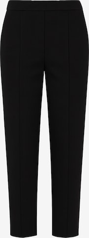 SASSYCLASSY Chino trousers in Black: front