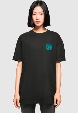 Merchcode T-Shirt 'Dance Under Stars' in Schwarz: Vorderseite