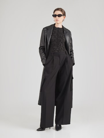 Wide leg Pantaloni con piega frontale 'Hubike' di HUGO in nero