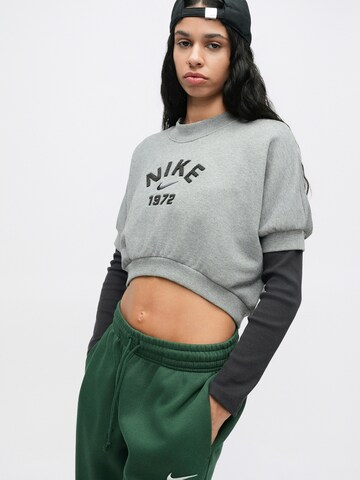 Nike SportswearTapered Hlače 'Phoenix Fleece' - zelena boja