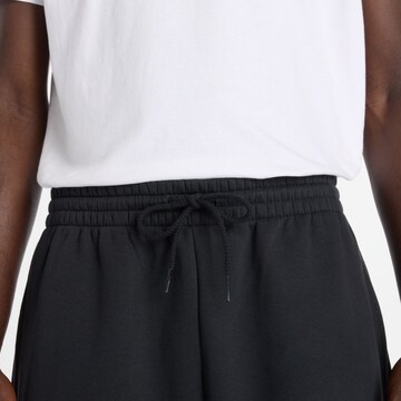 Regular Pantalon fonctionnel 'Reimagined' new balance en noir