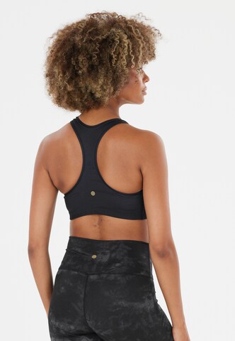 Athlecia Bustier Sportmelltartók 'Myolie' - fekete