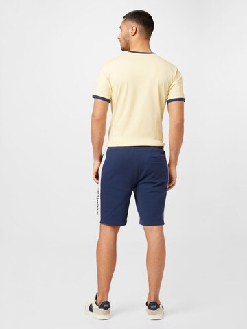 ELLESSE - regular Pantalón en azul