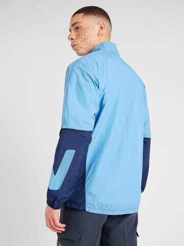 Veste de sport new balance en bleu