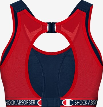 Shock Absorber x Champion padded high support running bra in navy and red