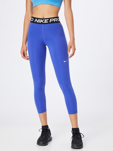 NIKE Skinny Sports trousers in Blue: front