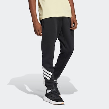 ADIDAS SPORTSWEAR Tapered Παντελόνι φόρμας 'Future Icons' σε μαύρο