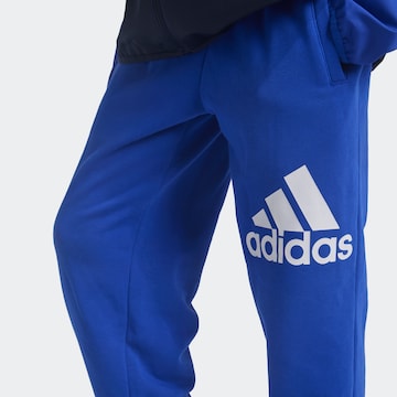 ADIDAS PERFORMANCE - Tapered Calças de desporto 'Essentials' em azul