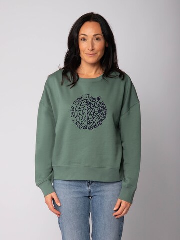 Felpa 'Don't overthink it ' di Watapparel in verde: frontale