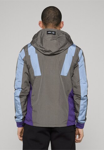 Giacca di mezza stagione 'Dmwu' di Unfair Athletics in grigio