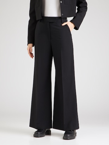 évasé Pantalon à plis & Other Stories en noir : devant