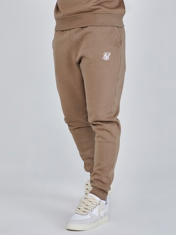 Tapered Pantaloni di SikSilk in marrone: frontale