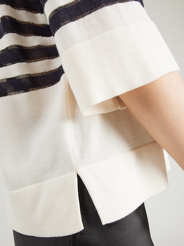 Pulover de la COMMA pe bej