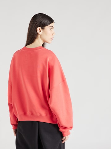 Sweat-shirt 'Essentials' ALPHA INDUSTRIES en rouge