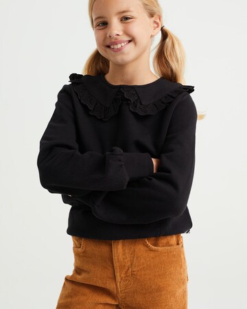 WE Fashion Пуловер 'Meisjes' в черно: отпред