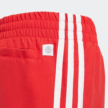 ADIDAS ORIGINALS Ujumispüksid 'Adicolor 3-Stripes', värv punane