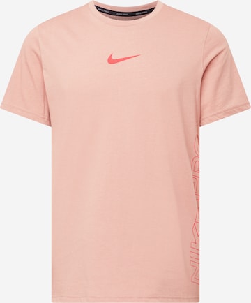 NIKE - Camiseta funcional 'Burnout' en rosa: frente