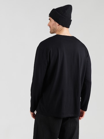 Tricou de la GCDS pe negru