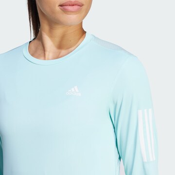 ADIDAS PERFORMANCE Functioneel shirt 'Own the Run' in Blauw