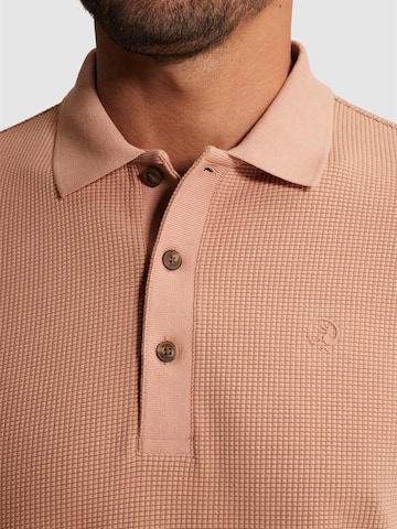 CAST IRON Paita 'Polo shirt with two-tone waffle texture' värissä oranssi