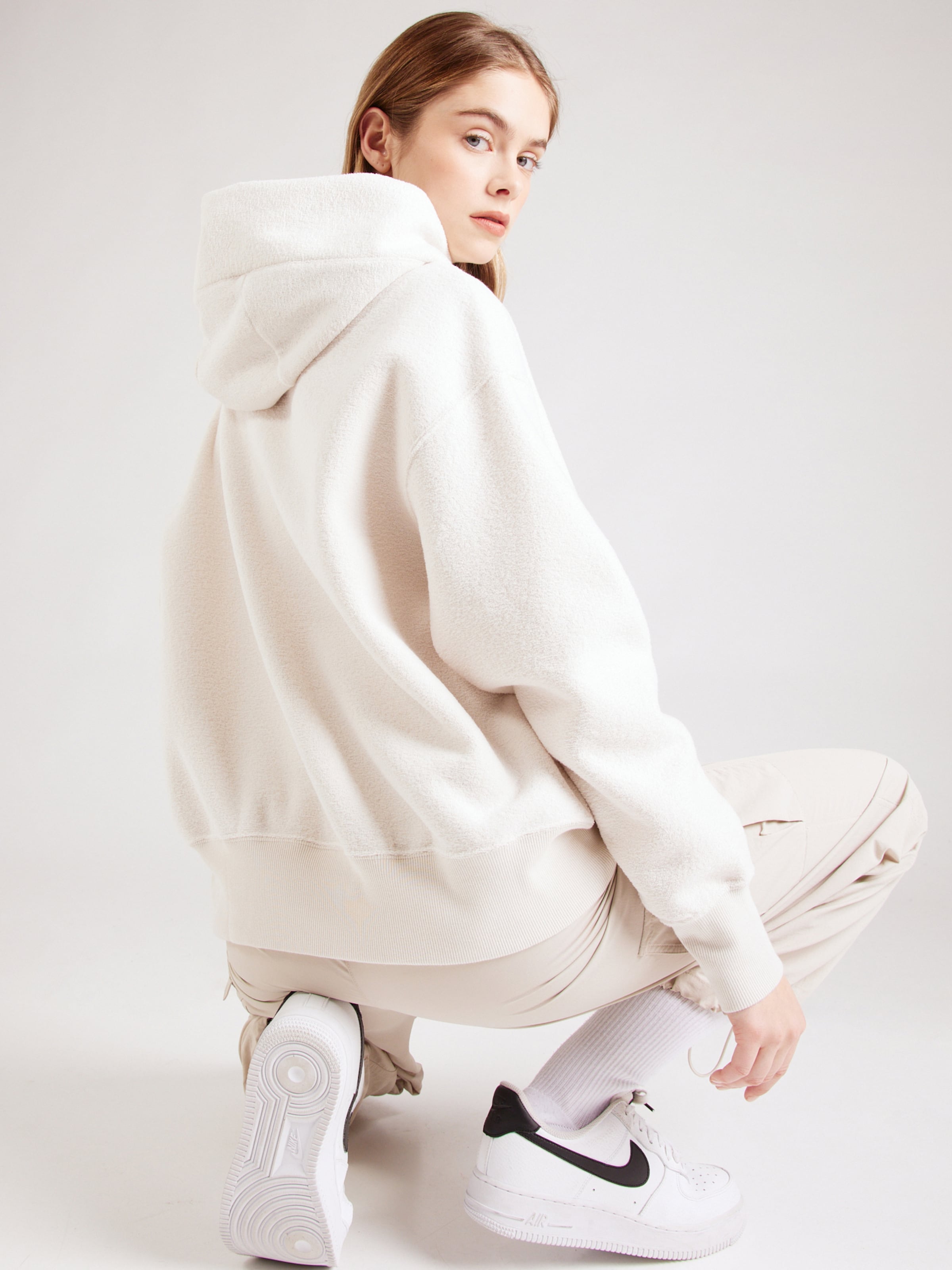Sweat shirt Phoenix Nike Sportswear en Creme ABOUT YOU