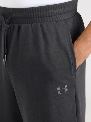 UNDER ARMOUR Свободный крой Спортивные штаны 'Rival' в Черный