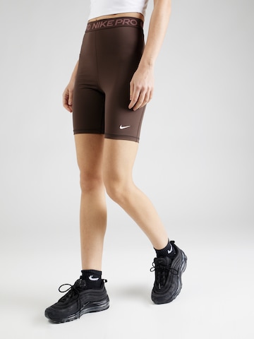 NIKESkinny Sportske hlače 'Pro 365' - smeđa boja: prednji dio