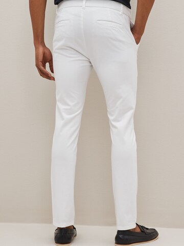 Skinny Pantalon chino Next en blanc