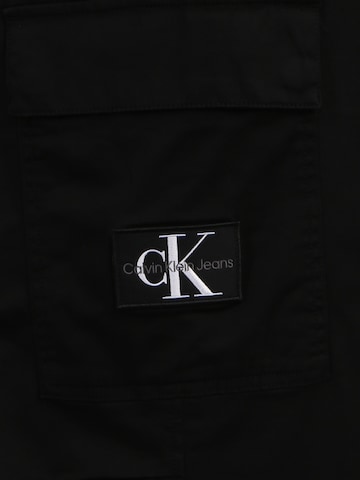 Calvin Klein Jeans Plus Regularen Kargo hlače | črna barva
