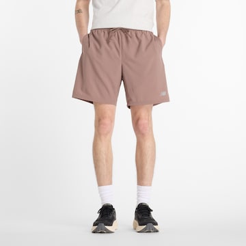 Regular Pantalon de sport 'Essentials 7' new balance en beige : devant