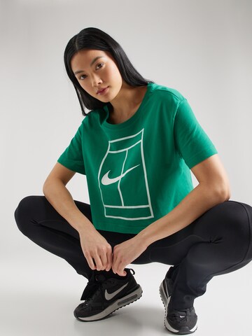 NIKE - Camiseta funcional 'HERITAGE' en verde