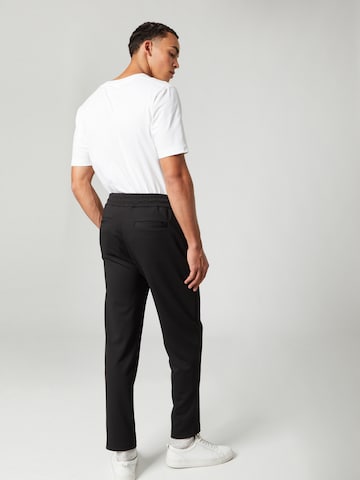 Guido Maria Kretschmer Men Regular Trousers with creases 'Enno' in Black