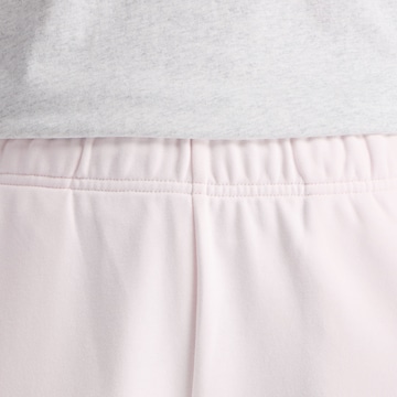 Effilé Pantalon 'Sport Essentials French Terry Jogger' new balance en rose