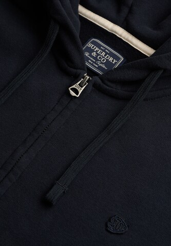 Veste de survêtement 'ESSENTIAL' Superdry & Co en bleu