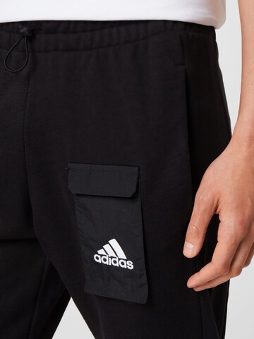 ADIDAS SPORTSWEAR Tapered Sportbyxa i svart