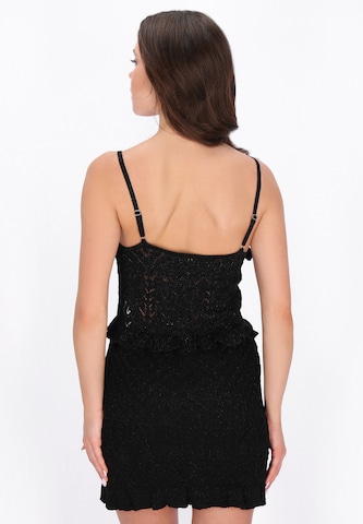 faina - Top de punto en negro