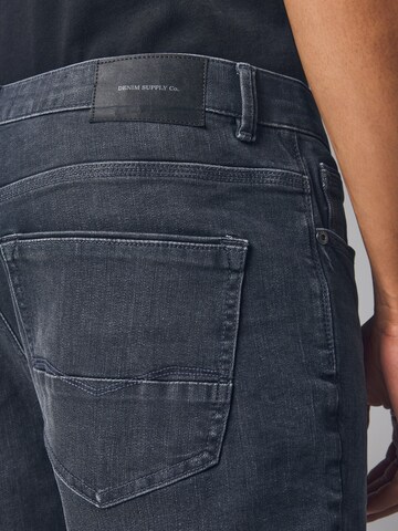 Next - Slimfit Vaquero en gris