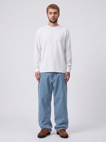 Carhartt WIP Baggy Jeans 'LANDON PANT Blue, Heavy stone wash' in Blauw: voorkant