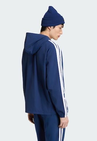 ADIDAS SPORTSWEAR - Chaqueta deportiva 'Essentials' en azul