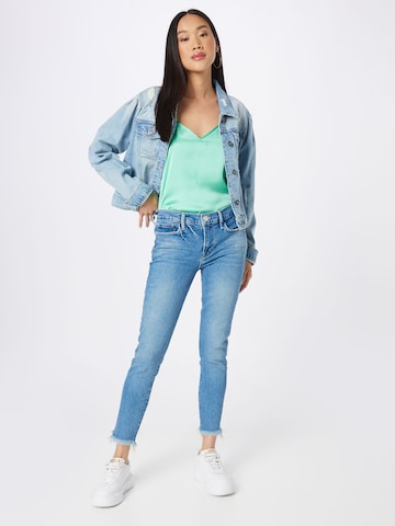 FRAME Skinny Jeans in Blau