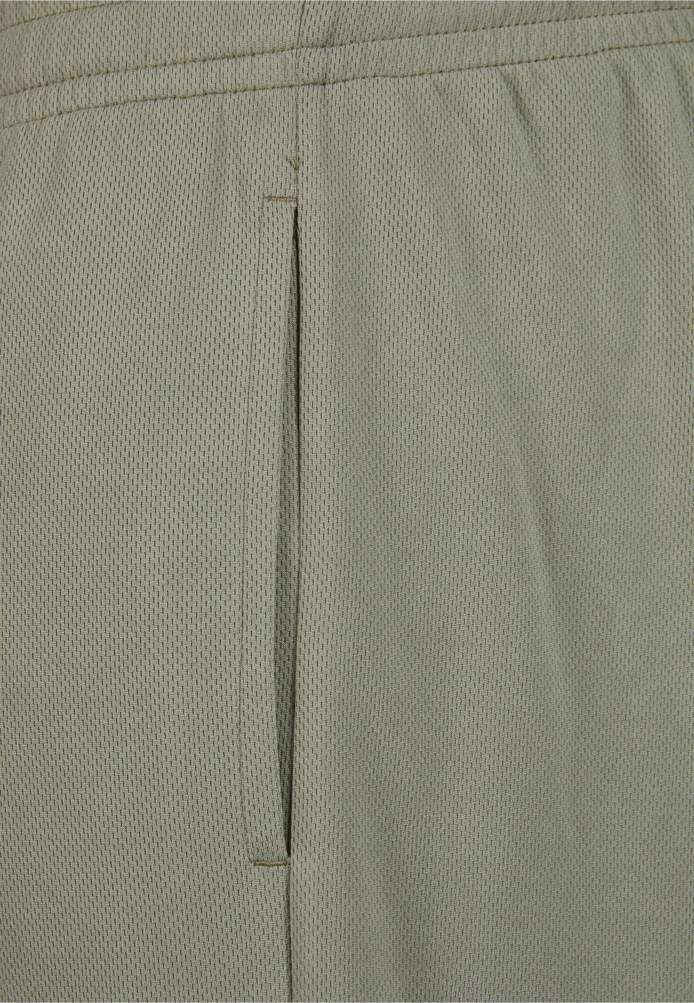 Karl Kani Regular Pants ' ' in Green