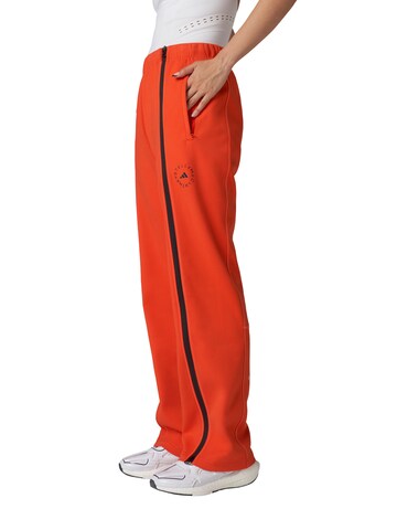 ADIDAS BY STELLA MCCARTNEY Boot cut Workout Pants in Orange: front