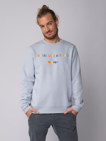 Watapparel Sweatshirt ' Spread Love not Hate ' in Blauw: voorkant