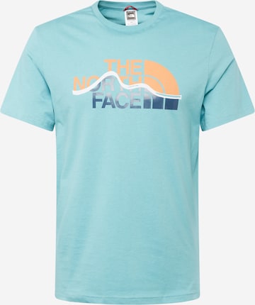 mėlyna THE NORTH FACE Marškinėliai 'MOUNTAIN': priekis